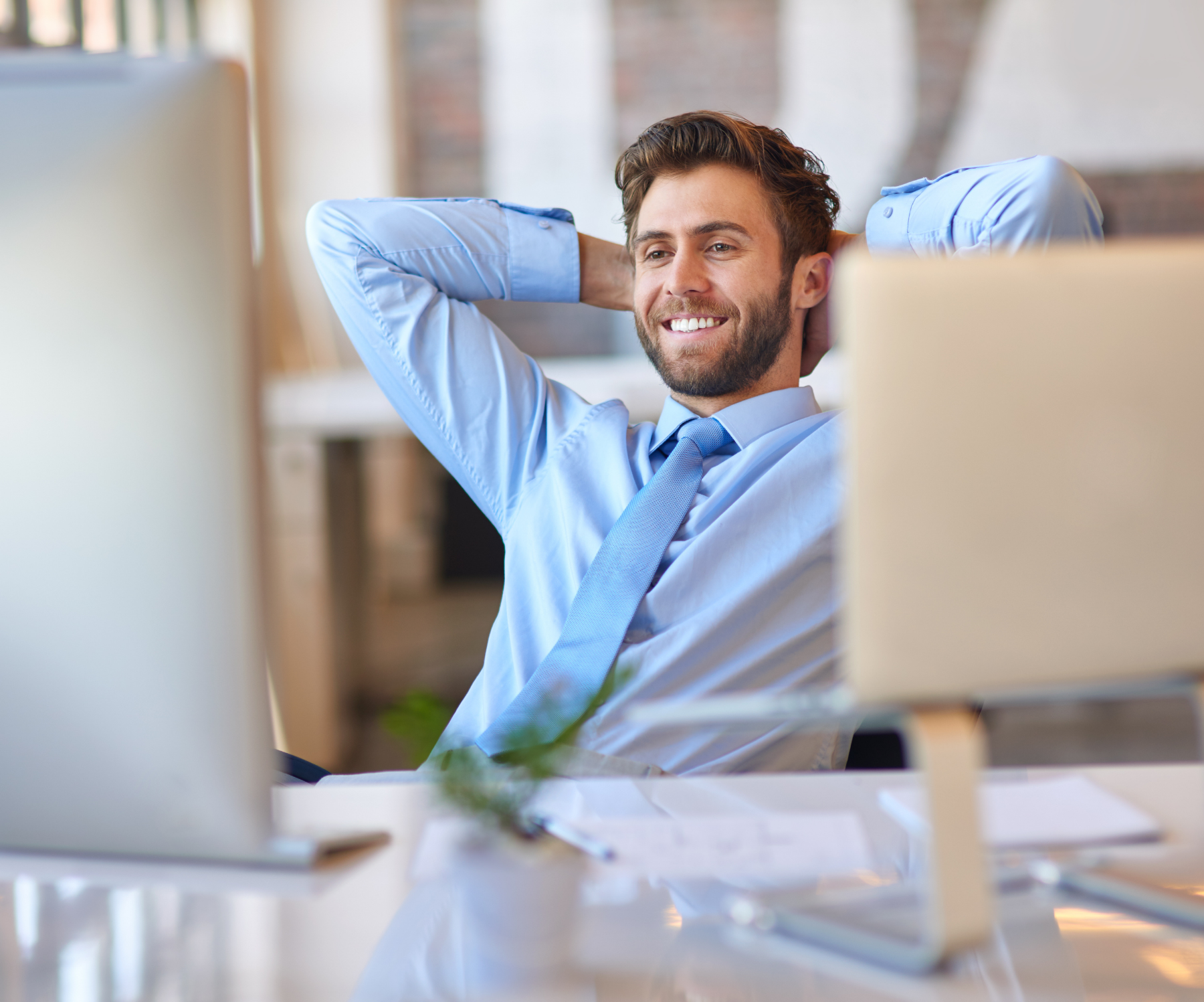 A business owner relaxing because Auxentia has them in good hands.